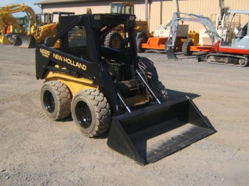 New holland LX665 farm tractor skid steer loader