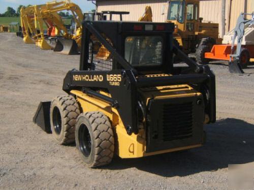 New holland LX665 farm tractor skid steer loader