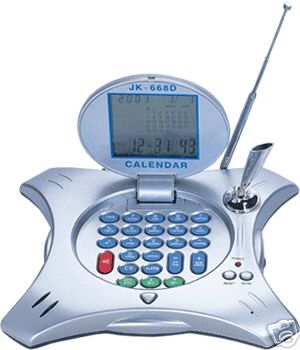  desk top radio, calculator, alarm clock and calendar