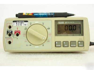 Fluke 37 benchtop digital multimeter with leads