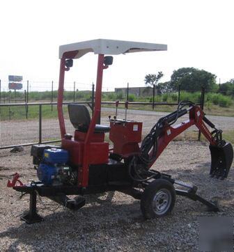 Towable back hoe