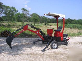 Towable back hoe