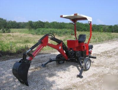 Towable back hoe