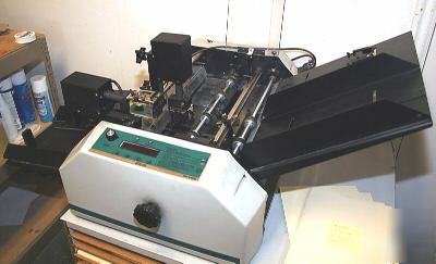 Graphic wizard 6000 numbering perforating scoring mach.