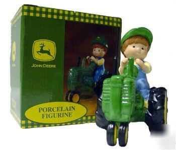 New john deere vintage porcelain figure boy on tractor 