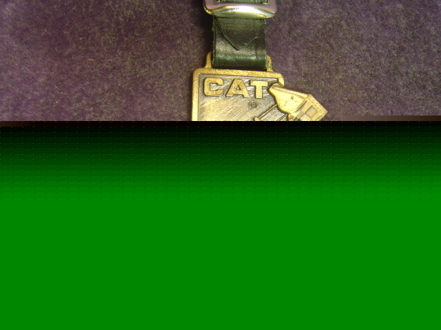 Vintage watch fob by caterpillar *nice*