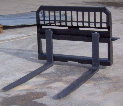 Pallet forks. bobcat skid steer caterpillar asv case