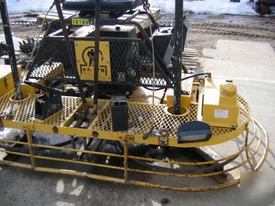 Wacker/allen ride on power trowel
