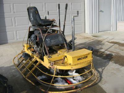 Wacker/allen ride on power trowel