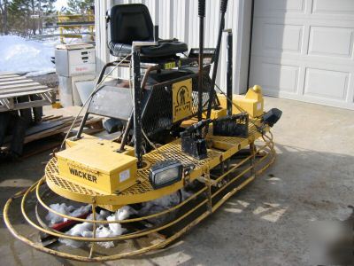 Wacker/allen ride on power trowel