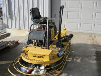 Wacker/allen ride on power trowel