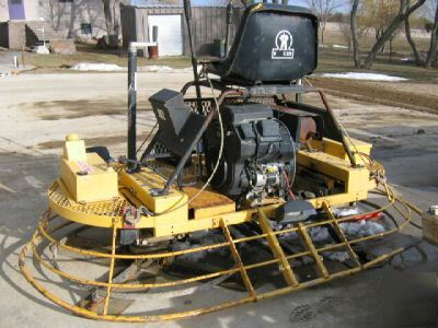 Wacker/allen ride on power trowel