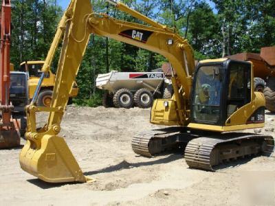 2002 cat 311CU excavator, good u/c, 26K lbs