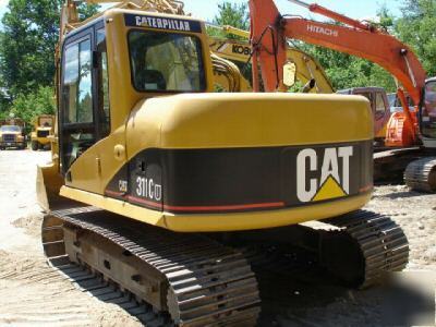 2002 cat 311CU excavator, good u/c, 26K lbs