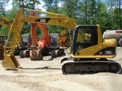 2002 cat 311CU excavator, good u/c, 26K lbs