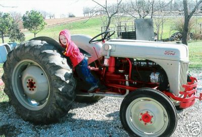 8N ford farm tractor red and grey late 40's model