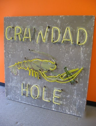 Neon sign crawdad hole indoor resturaunt signage