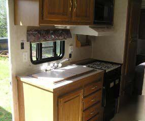 1997 sportsmen 26 travel trailer with a slide-out