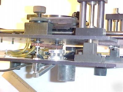 Linear slide w. vert motion rotation and micrometer adj