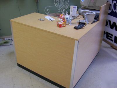 Custom made store shelving, gondolas, and cash wrap