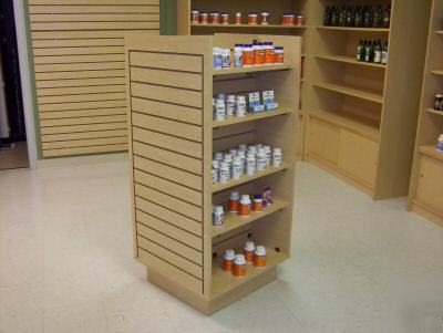 Custom made store shelving, gondolas, and cash wrap