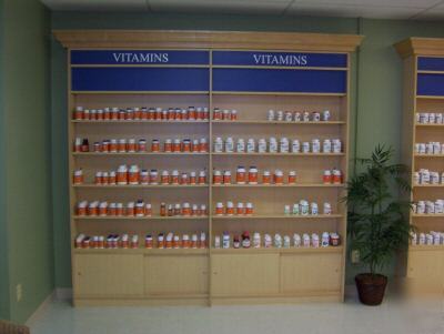 Custom made store shelving, gondolas, and cash wrap