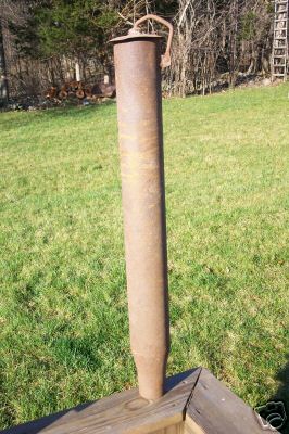 Antique old farm tractor machine exhaust muffler stack