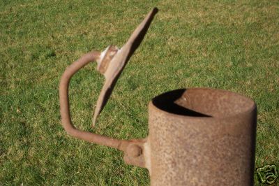 Antique old farm tractor machine exhaust muffler stack