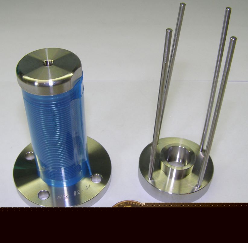 Two precision steel parts...nso 82-41 bellows(lifter)